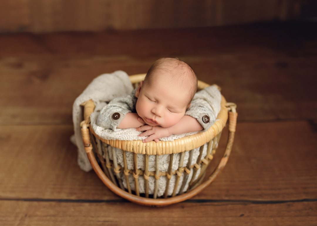 Newborn baby photographed at EvaGud Photography studio in Barking