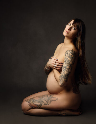 mum to be with tattoo photography in Romford