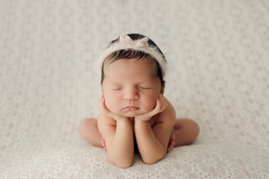Newborn baby photographed at EvaGud Photography studio in Barking